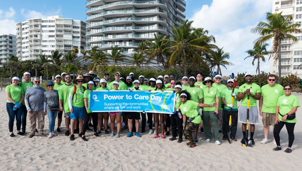 Group picture of the Power to Care Beach clean up event Group picture of the Power to Care Beach clean up event